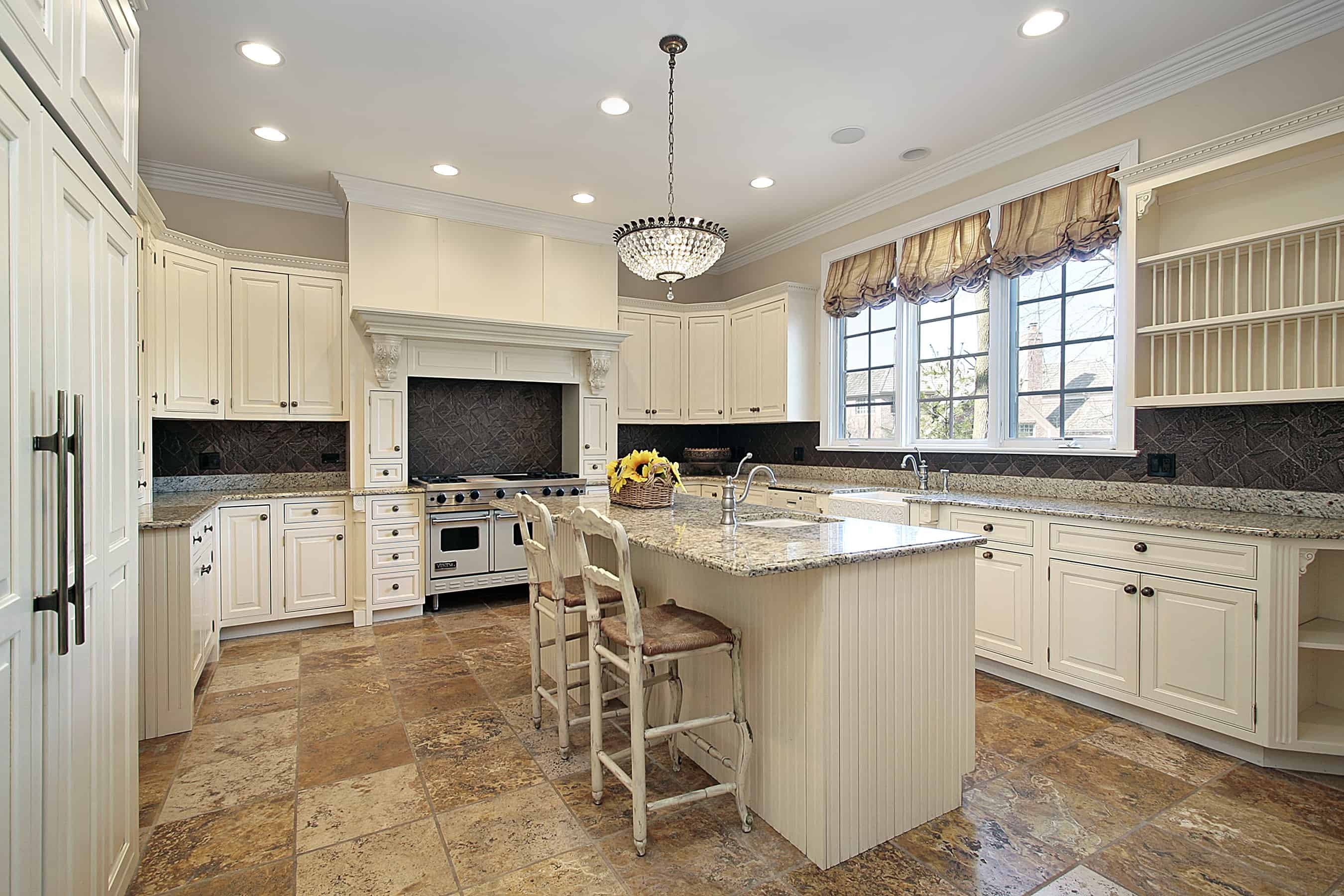 Kitchen In Luxury Home With Light Wood Cabinetry 